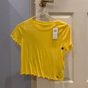 Hollister Yellow Lettuce Hem Crop T-shirt